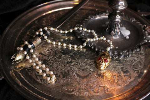 Gilded Skull Rosary Style Necklace