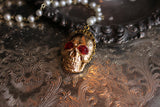 Gilded Skull Rosary Style Necklace