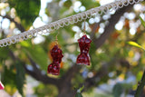 Tall Gold Leaf And Red Glitter Goddess Earrings