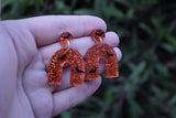 Orange Glitter and Bats Resin Earrings