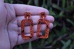 Orange Glitter and Bats Resin Earrings